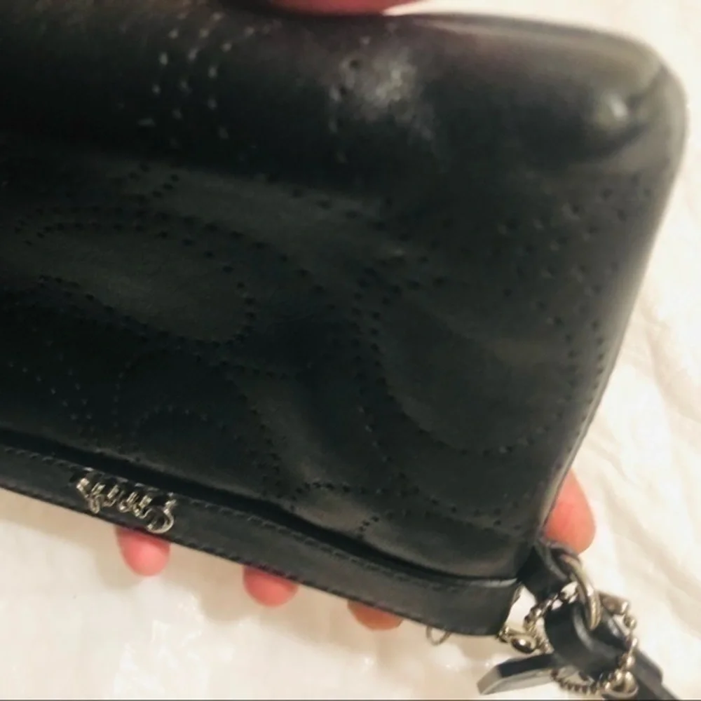 Coach signature perforated c wristlet bag